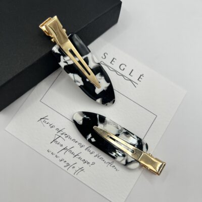 baltos ir juodos spalvos makiažo plaukų segtukai