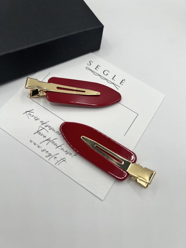 raudonos spalvos makiažo plaukų segtukai su metaliniu aukso spalvos užsegimu